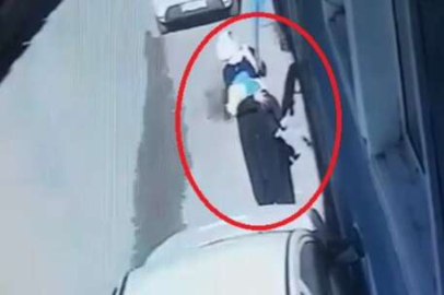 Kucağındaki bebeğe aldırmadan battaniye çalan şahıs kameralara yakalandı