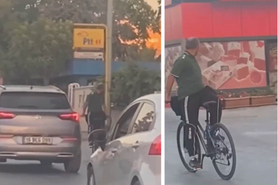 Görenler cep telefonlarına sarıldı... Bisikletini tersten sürdü