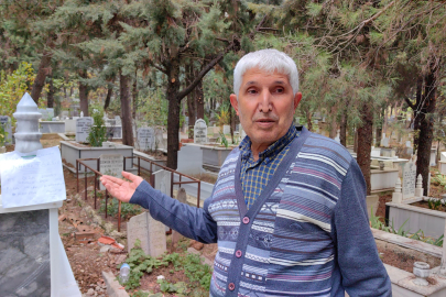 Babasının mezarından çiçek çalan hırsıza not bıraktı