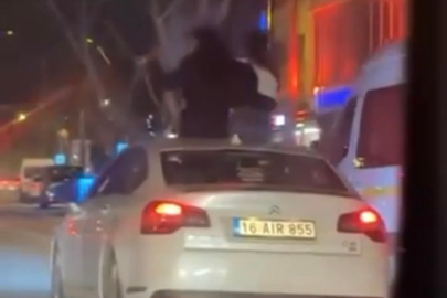 Bursa'da otomobilin tavanına oturdular : 25 bin TL ceza kesildi