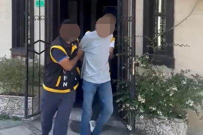 Polise yakalanmamak için saçını kazıttı, yine kaçamadı